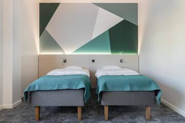 Фото номера Стандартный трехместный номер Отель GreenStar Hotel Vaasa г. Вааса 9