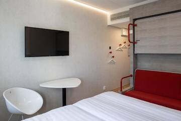 Фото номера Семейный номер Отель Omena Hotel Vaasa Espen г. Вааса 25