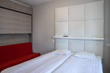 Фото номера Семейный номер Отель Omena Hotel Vaasa Espen г. Вааса 10