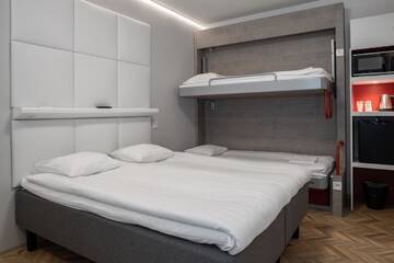 Фото номера Семейный номер Отель Omena Hotel Vaasa Espen г. Вааса 23