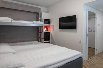 Фото номера Семейный номер Отель Omena Hotel Vaasa Espen г. Вааса 20