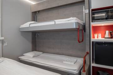 Фото номера Семейный номер Отель Omena Hotel Vaasa Espen г. Вааса 22